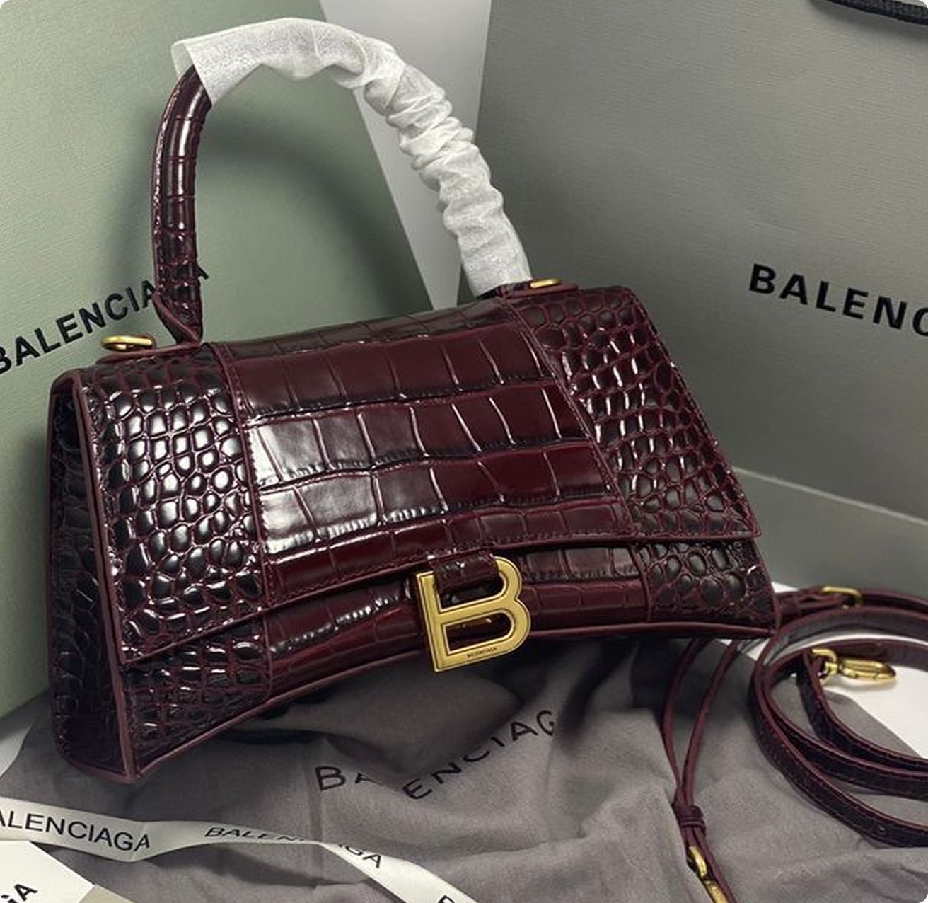 Burgundy crocodile-effect Balenciaga top-handle bag